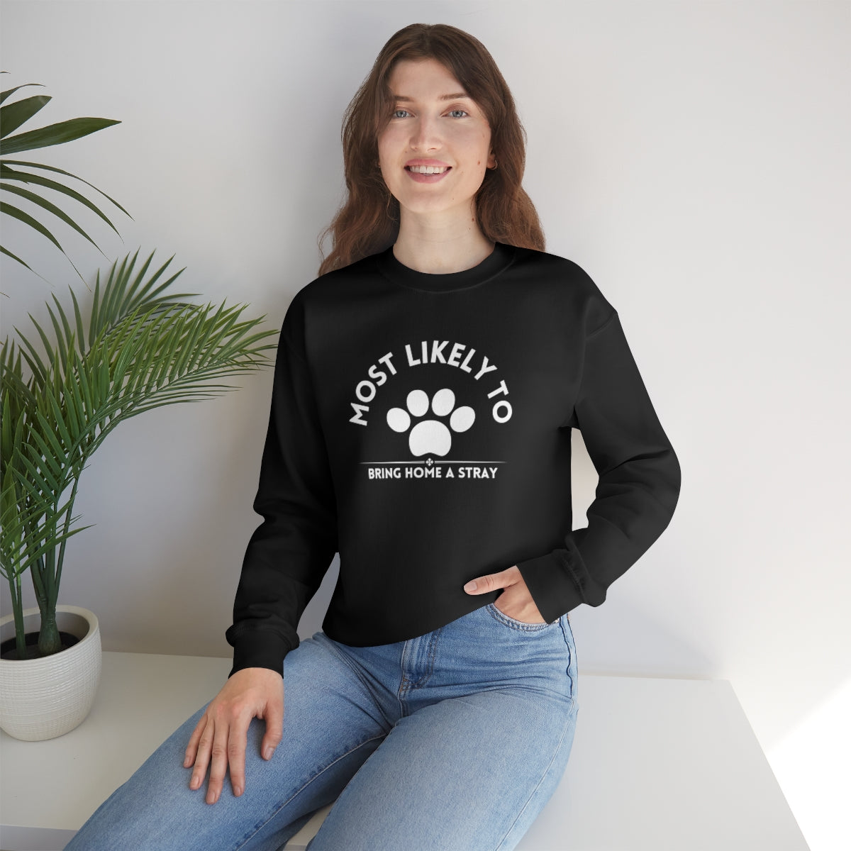 Most Likely to Bring Home a Stray. lUnisex Heavy Blend™ Crewneck Sweatshirt